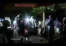 a photo of people in a night dance