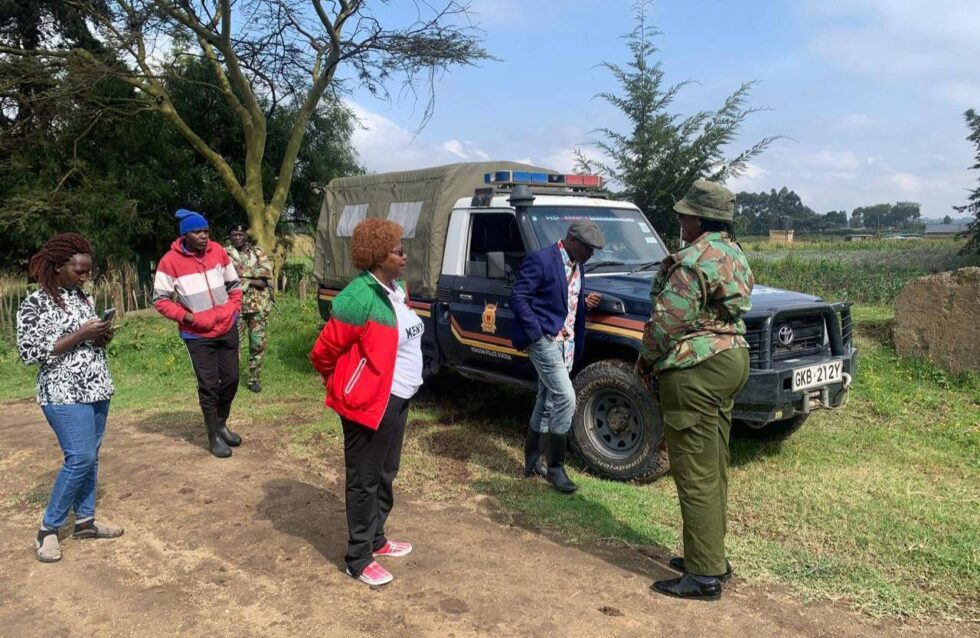 Jayne kihara with police outside her residence