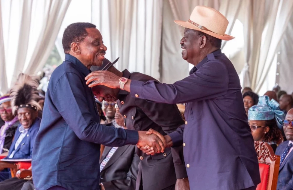 Siaya Governor James Orengo and ODM party leader Raila Odinga at the burial of former Karachuonyo MP Phoebe Asiyo in Homa Bay on August 8,