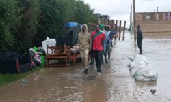 A SECTION OF KIHOTO RESIDENTSS STRANDED AFTER FLOODS INADED THEIR HOUSES